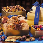 Three elegant gold boxes are stacked high and filled with some of the most popular gourmet treats.